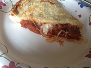 Slice of Meatball and Italian Sausage Stuffed Pizza